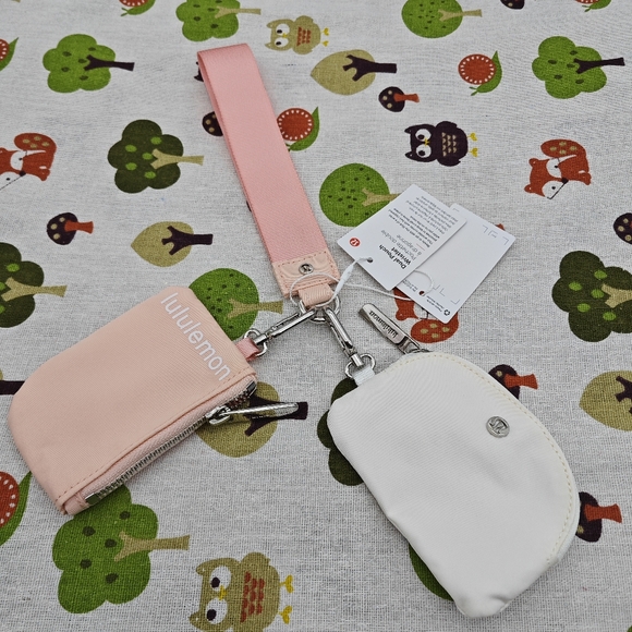 lululemon athletica Accessories - Lululemon Pink and White Wristlet